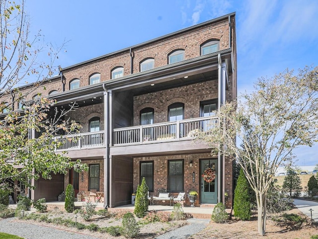 view of property with a balcony