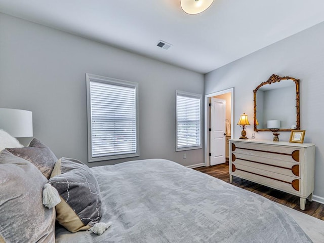 bedroom featuring dark hardwood / wood-style floors