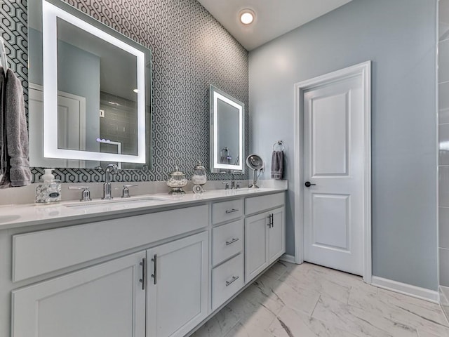 bathroom with vanity and walk in shower