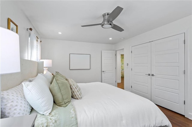 bedroom featuring recessed lighting, dark wood-style floors, a closet, and ceiling fan