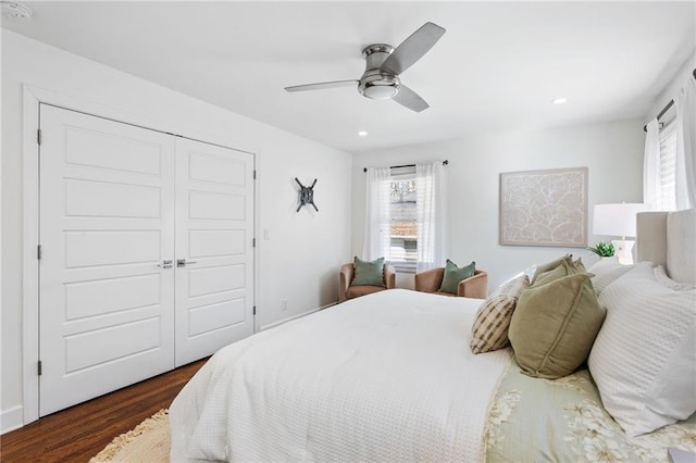 bedroom featuring dark wood-type flooring, recessed lighting, a closet, and ceiling fan