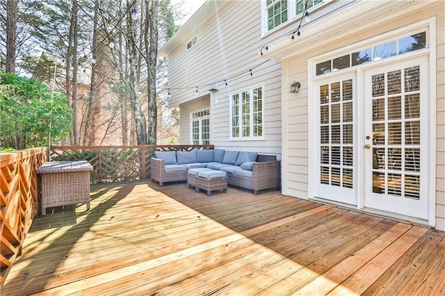 wooden deck with outdoor lounge area