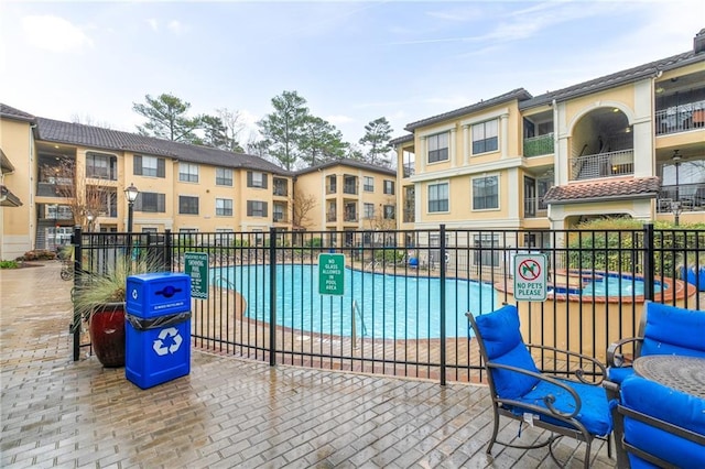 view of pool featuring a patio