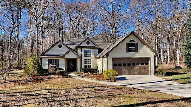 traditional-style home with a garage and driveway