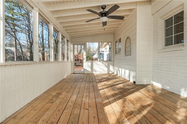 wooden terrace featuring ceiling fan