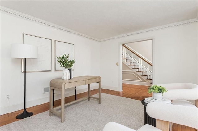 office area with light hardwood / wood-style floors