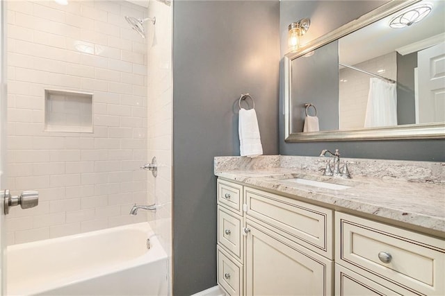 full bath with vanity and shower / bath combo with shower curtain