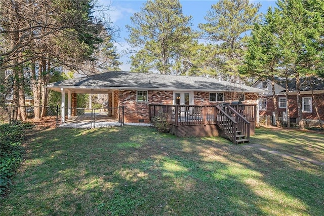 back of property featuring fence private yard, brick siding, a yard, crawl space, and a wooden deck