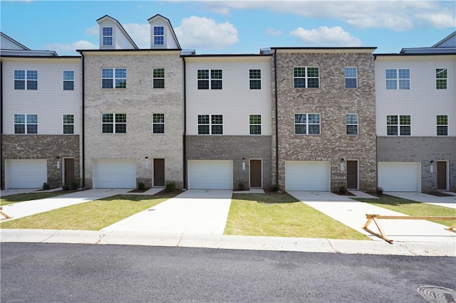 exterior space with an attached garage and driveway