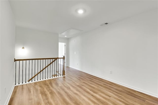 5312 Brooklands Dr, Lithonia, GA 30058 - unfurnished room featuring attic access and wood finished floors