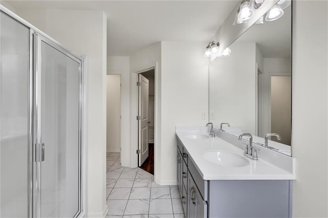 5312 Brooklands Dr, Lithonia, GA 30058 - bathroom with marble look tiles, double vanity, and a stall shower
