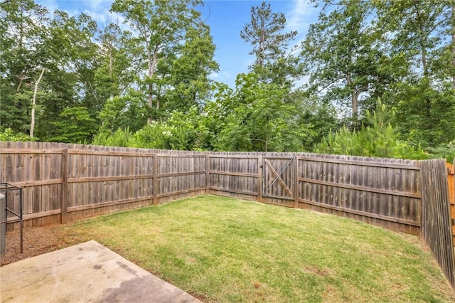 5312 Brooklands Dr, Lithonia, GA 30058 - fenced backyard featuring a patio area