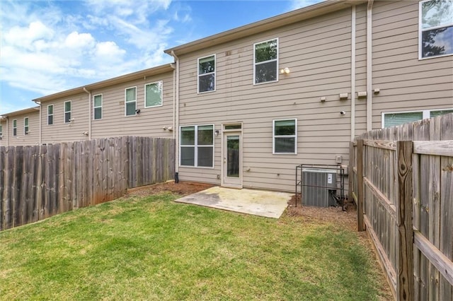5312 Brooklands Dr, Lithonia, GA 30058 - rear view of house featuring a fenced backyard and a patio area