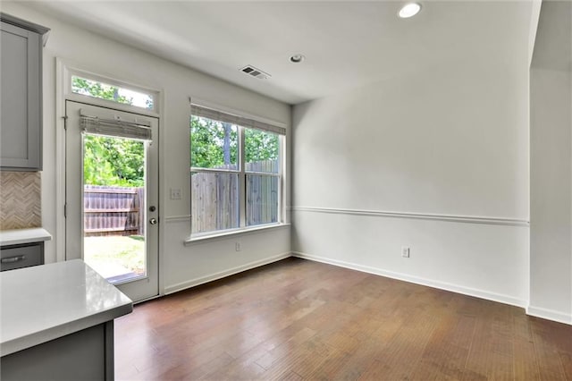 5312 Brooklands Dr, Lithonia, GA 30058 - unfurnished dining area featuring wood finished floors and recessed lighting