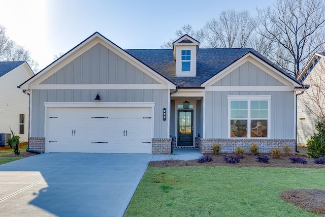 view of front of property with brick siding, board and batten siding, a shingled roof, driveway, and an attached garage