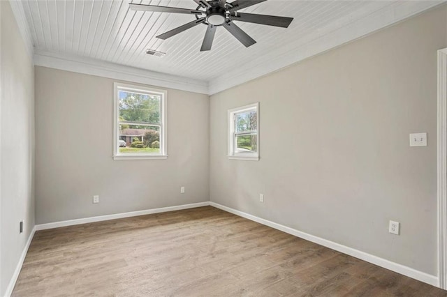 empty room with wooden ceiling, ceiling fan, ornamental molding, and light wood-type flooring