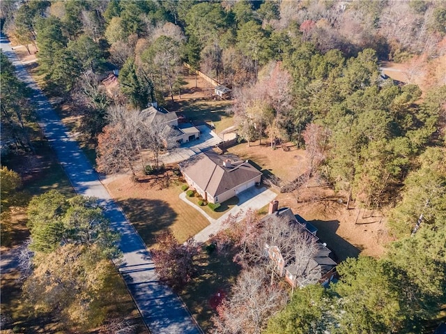 bird's eye view featuring a view of trees