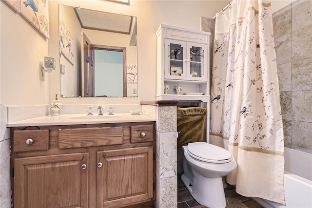 bathroom with vanity, toilet, and shower / tub combo with curtain