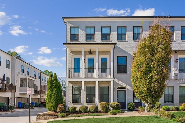 2034 Rockledge Rd NE, Atlanta, GA 30324 - multi unit property featuring brick siding and a balcony