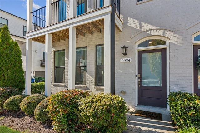 2034 Rockledge Rd NE, Atlanta, GA 30324 - entrance to property with brick siding and a balcony