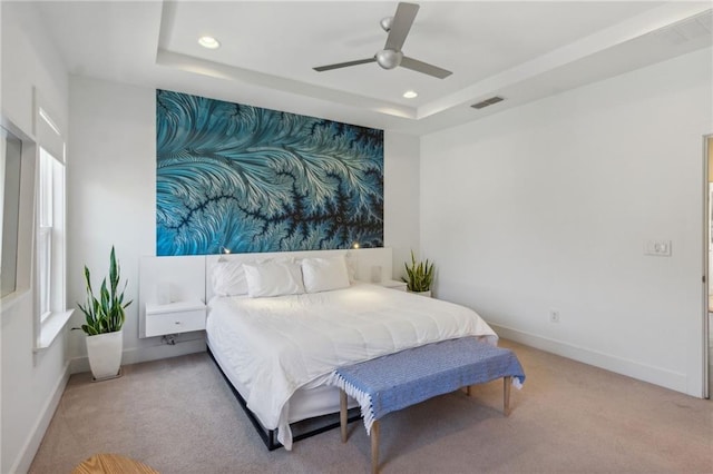 2034 Rockledge Rd NE, Atlanta, GA 30324 - carpeted bedroom with a tray ceiling, baseboards, recessed lighting, ceiling fan, and multiple windows