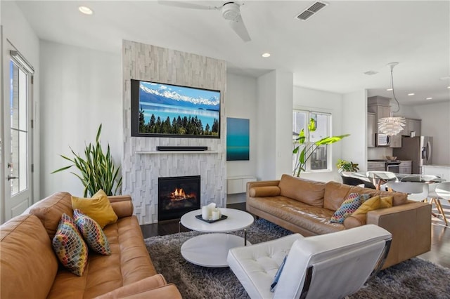 2034 Rockledge Rd NE, Atlanta, GA 30324 - living room with wood finished floors, a fireplace, a ceiling fan, and recessed lighting