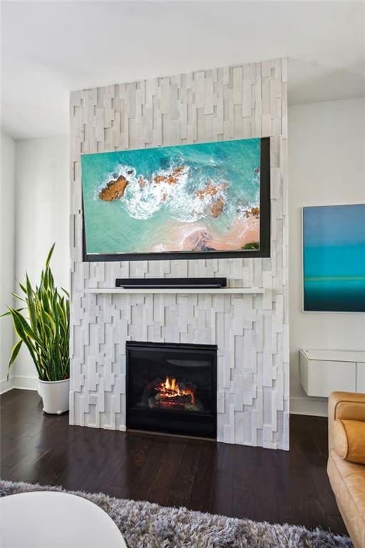 2034 Rockledge Rd NE, Atlanta, GA 30324 - detailed view of baseboards, wood finished floors, and a fireplace