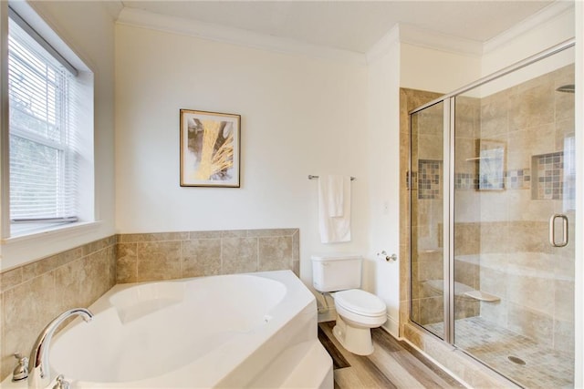 bathroom featuring a wealth of natural light, crown molding, independent shower and bath, and toilet