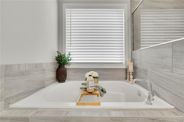 full bathroom featuring a garden tub