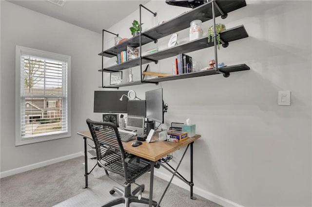 office area featuring baseboards and carpet floors