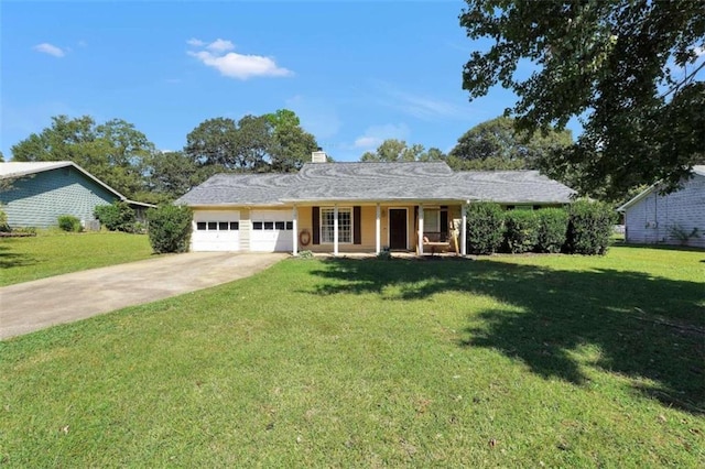 ranch-style home with an attached garage, concrete driveway, a chimney, and a front yard