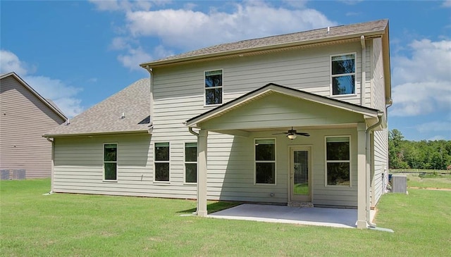 back of property featuring central AC, a lawn, a patio, and ceiling fan