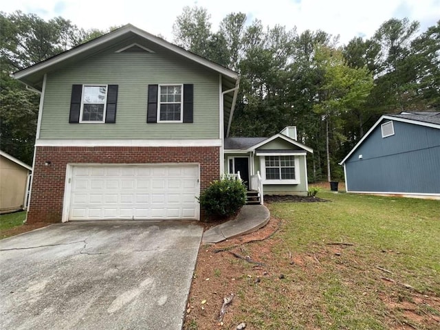 view of front facade featuring a front yard and a garage