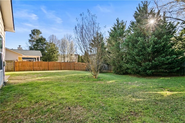 view of yard with fence