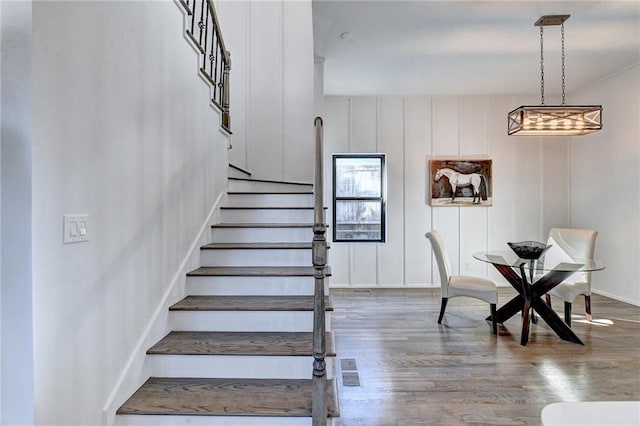 278 Lindbergh Dr NE, Atlanta, GA 30305 - stairway featuring hardwood / wood-style floors