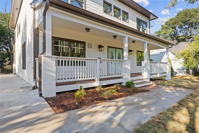 view of front of home featuring covered porch