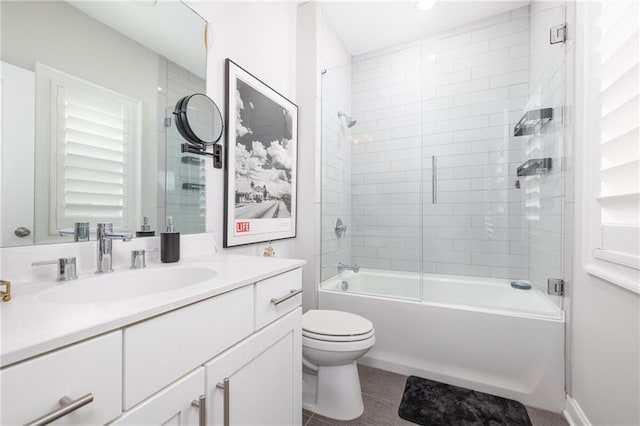 410 Concord St, Alpharetta, GA 30009 - full bath featuring vanity, toilet, combined bath / shower with glass door, and tile patterned floors