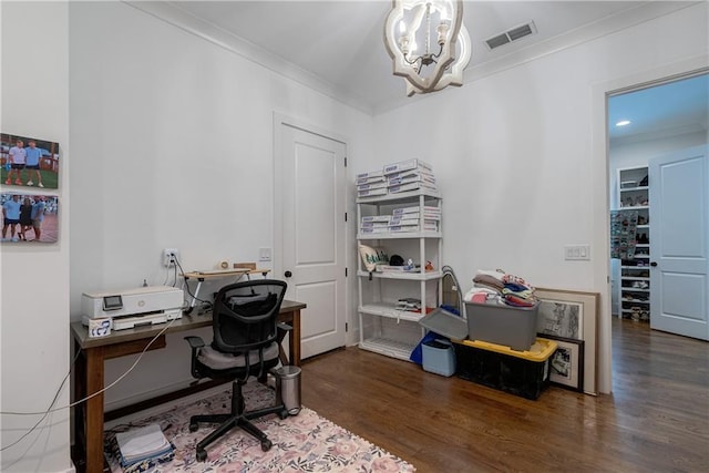 office space featuring ornamental molding, dark hardwood / wood-style floors, and an inviting chandelier