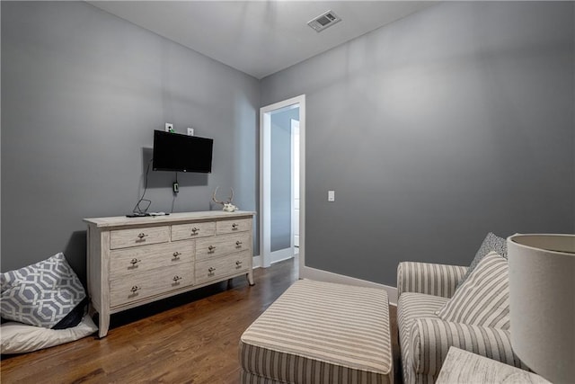 living area with dark hardwood / wood-style floors