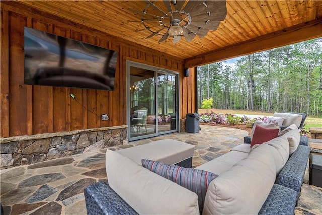 view of patio featuring ceiling fan and an outdoor hangout area