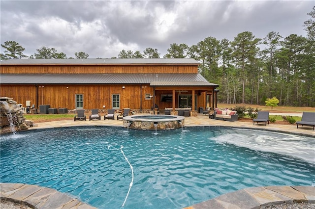 view of swimming pool featuring an in ground hot tub, cooling unit, a patio, an outdoor living space, and pool water feature