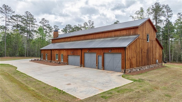 garage with a lawn