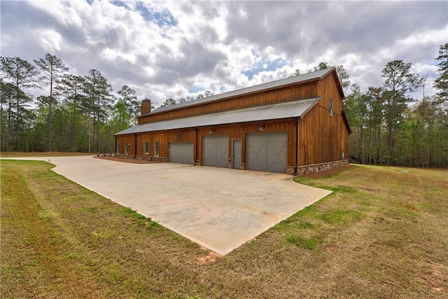 garage with a lawn