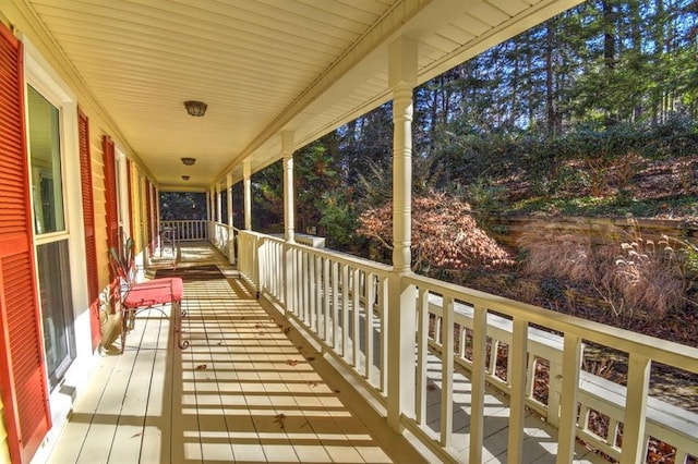 balcony featuring a porch