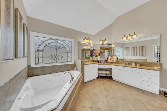 bathroom featuring high vaulted ceiling, tile floors, and vanity