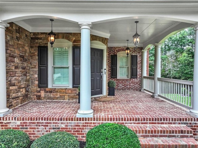 entrance to property featuring a porch