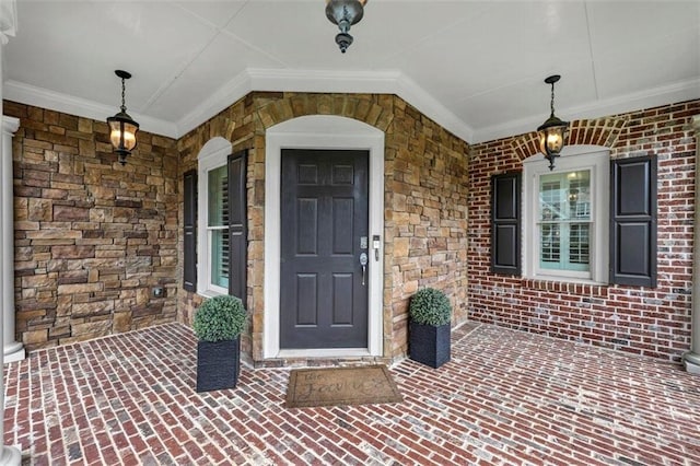 doorway to property featuring a porch