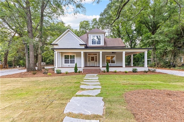 view of front facade with a porch and a front lawn