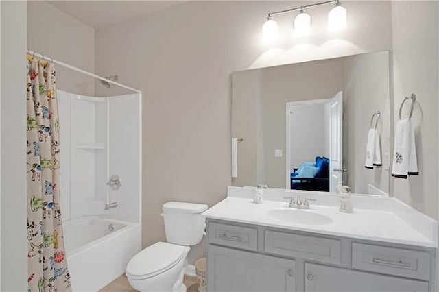 full bathroom with vanity, shower / bath combination with curtain, and toilet