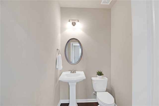 bathroom featuring toilet